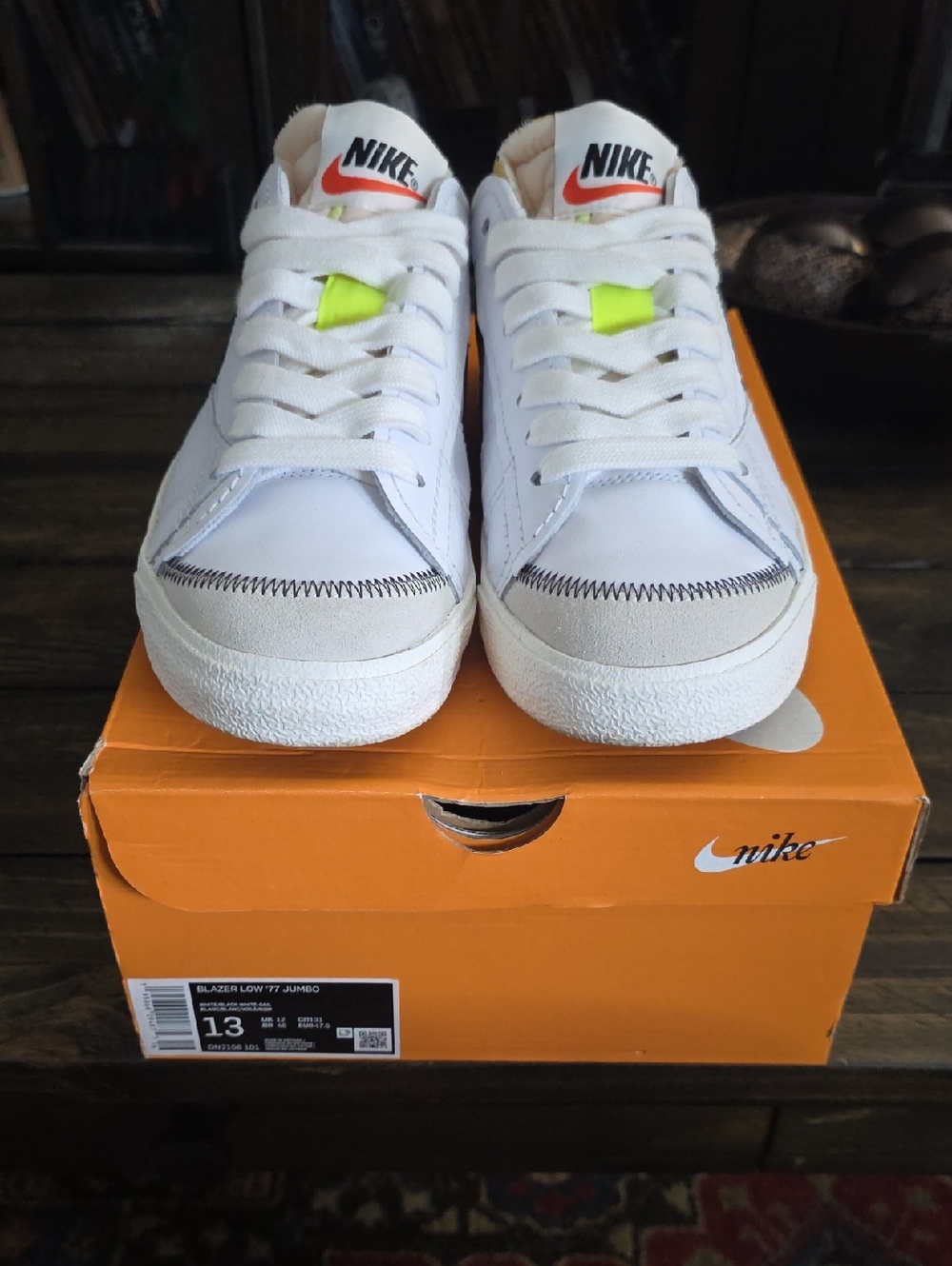 Nike Men's White Athletic Sneakers with Neon Yellow and Orange Accents